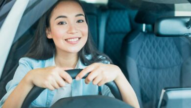 Happy woman, driving